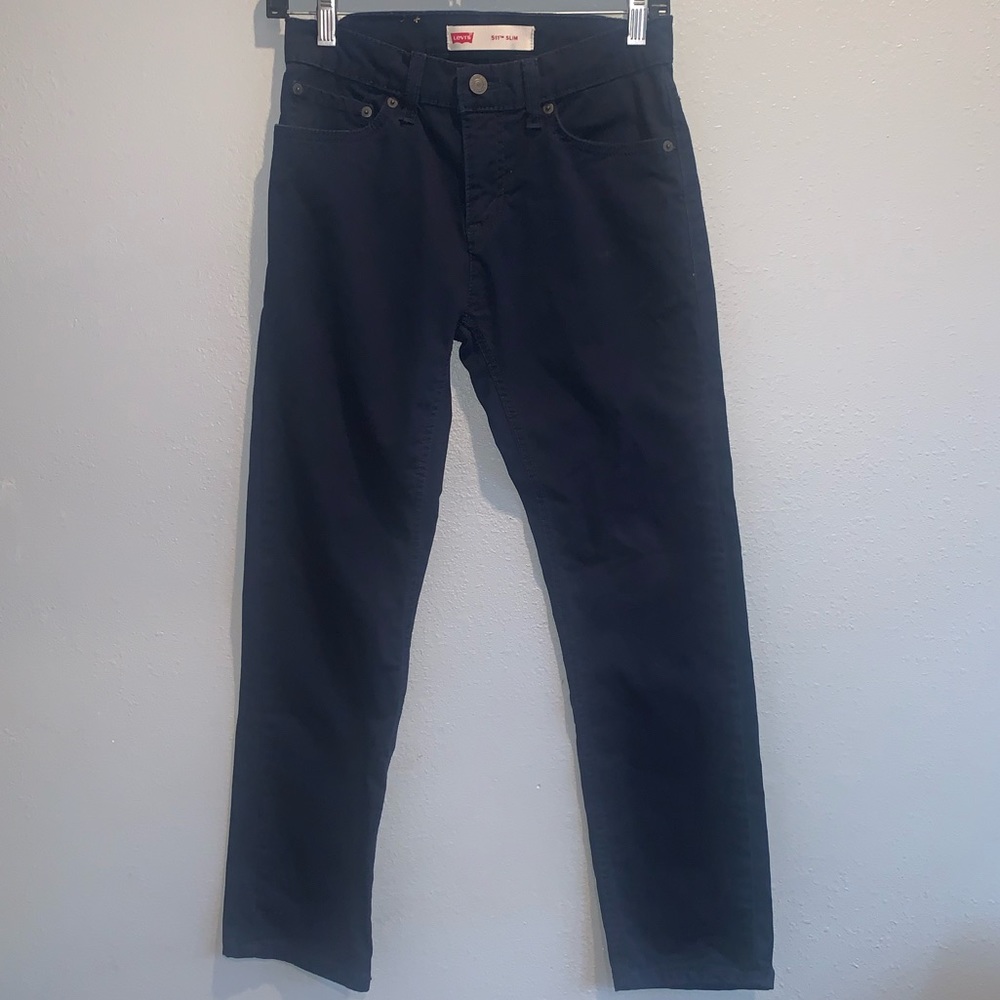navy blue Levi’s 511 slim jeans